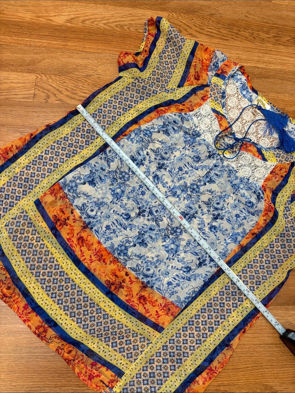 Fig & Flower blue, yellow & orange short sleeve semi-sheer top. Size M.